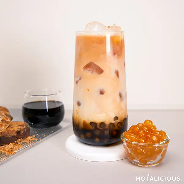 Brown sugar milk with pearls and milk foam – multi-layered and popular in bubble tea.