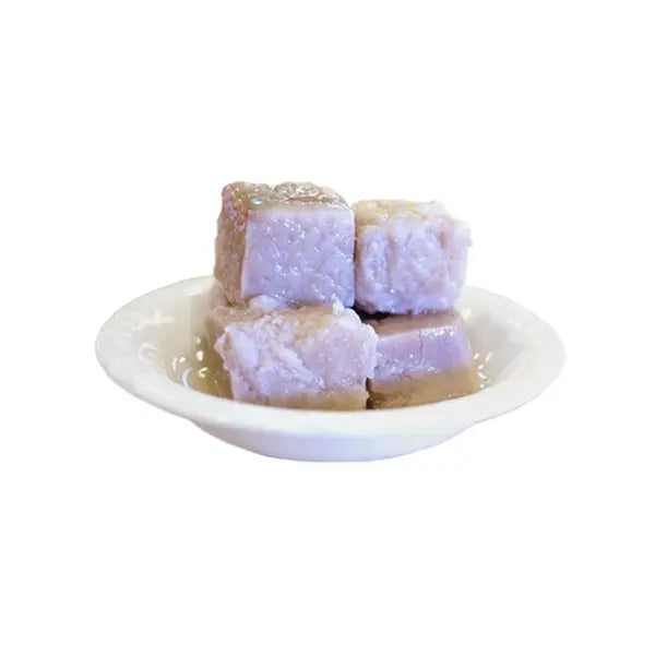 Canned diced taro cubes served in syrup, soft and creamy texture, perfect for Asian desserts and milk teas.