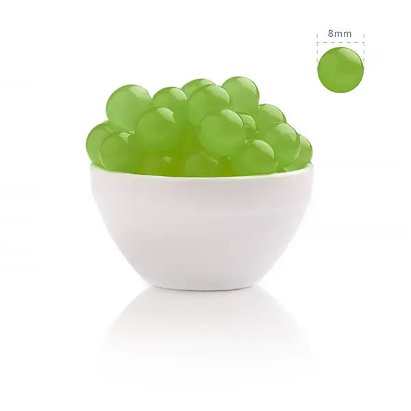 Kiwi popping boba with vibrant green color and tropical tartness, ideal for fruit teas and yogurt drinks.