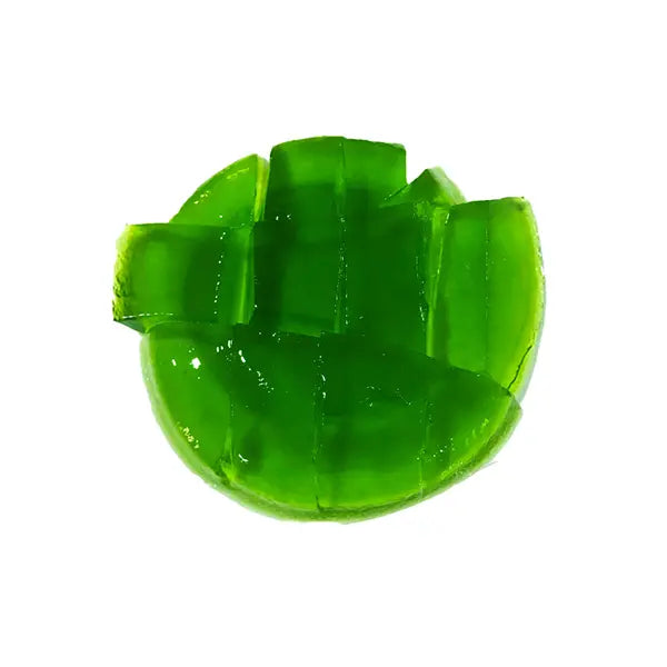 Green pandan jelly cubes with glossy surface, perfect as a refreshing topping for Asian drinks and desserts.