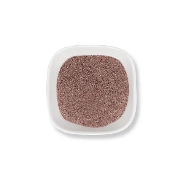 Finely ground Thai tea powder in bold orange hue, ideal as a base for milk tea and iced drinks.