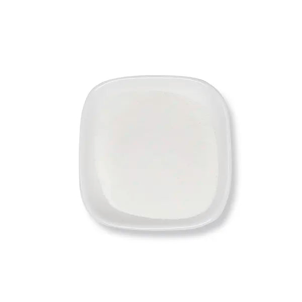 Top-down view of fine white watermelon powder, ideal for various beverage applications.