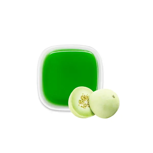 Honeydew syrup with melon slices – vibrant green and aromatic.