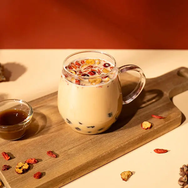 Ginger brown sugar milk tea – warming winter wellness drink.
