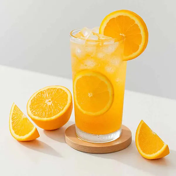 Fruit tea with orange slices – refreshing citrus beverage perfect for summer.