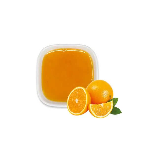 Orange syrup with sliced oranges – bright citrus color and juicy aroma.