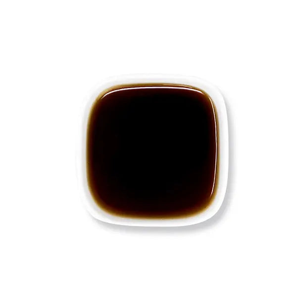Top view of tiger sugar syrup – dark, thick caramelized texture.
