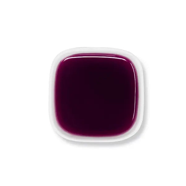 Top view of grape syrup – consistent deep violet tone, tangy aroma.