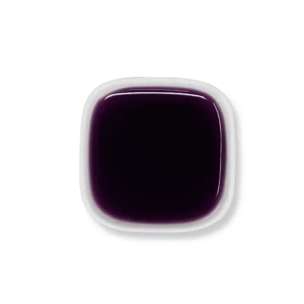Top view of taro syrup with smooth deep purple color.