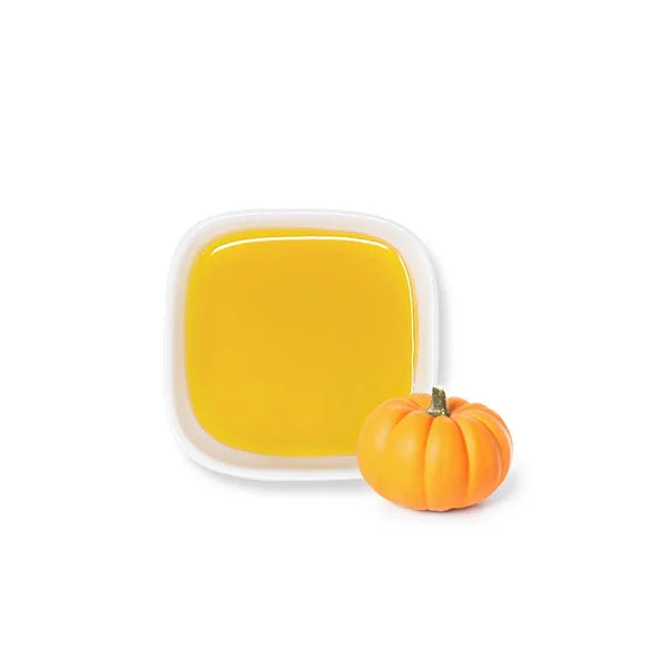 Pumpkin spice syrup with fresh pumpkin – golden color and smooth texture.