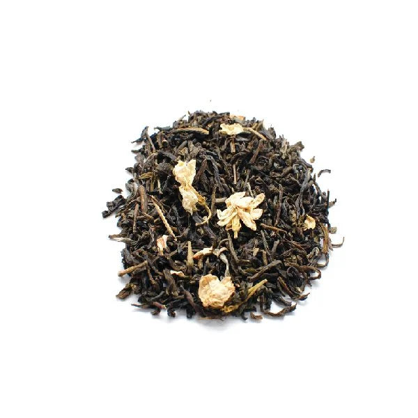 Dried jasmine green tea leaves with visible jasmine petals.
