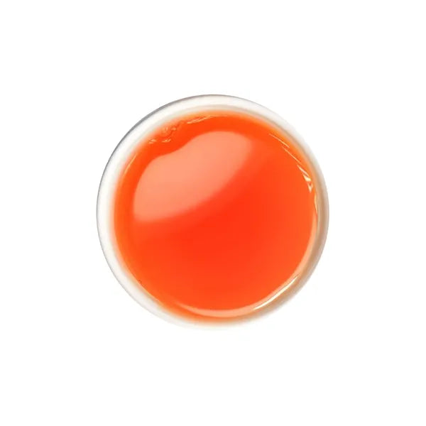 Brewed Assam black tea with bright reddish hue and rich malty flavor.