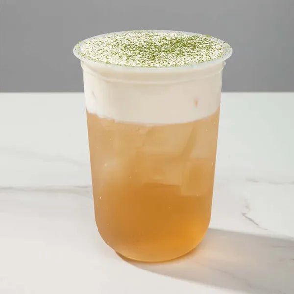 Jin Fong oolong milk foam cold brew with golden liquor and creamy cap.