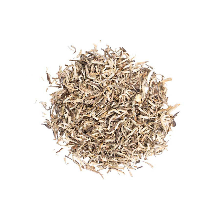 Imperial Snow Jasmine loose leaf tea with delicate silver buds and fresh jasmine fragrance.
