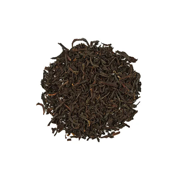 Dried Earl Grey black tea leaves with visible texture and bergamot aroma.