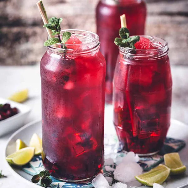 Iced blueberry fruit tea with lemon and mint – refreshing and vibrant.