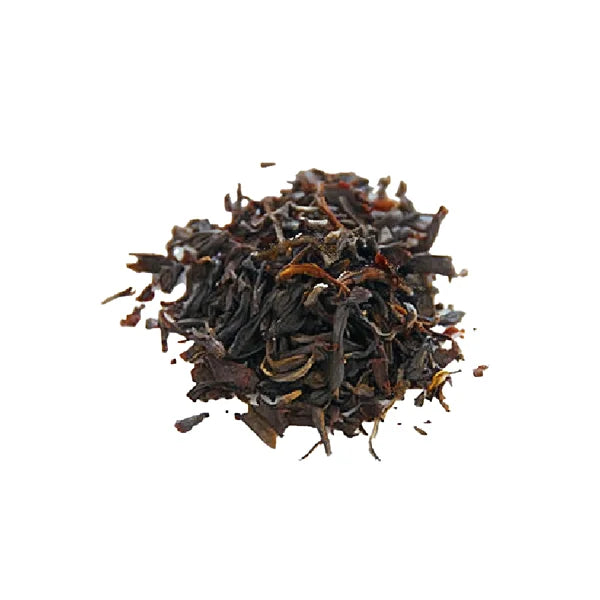 Dry roasted oolong tea leaves with deep brown color and twisted shape.