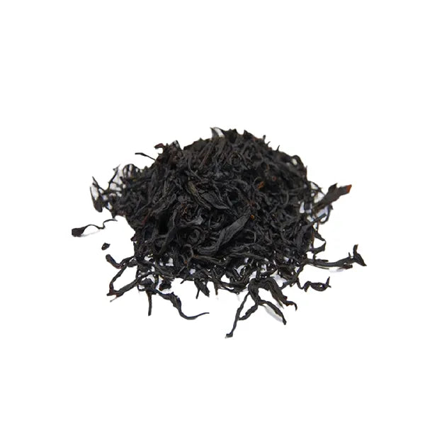 Dried Ruby Red (Taiwan No.18) tea leaves with curled, glossy black strands.