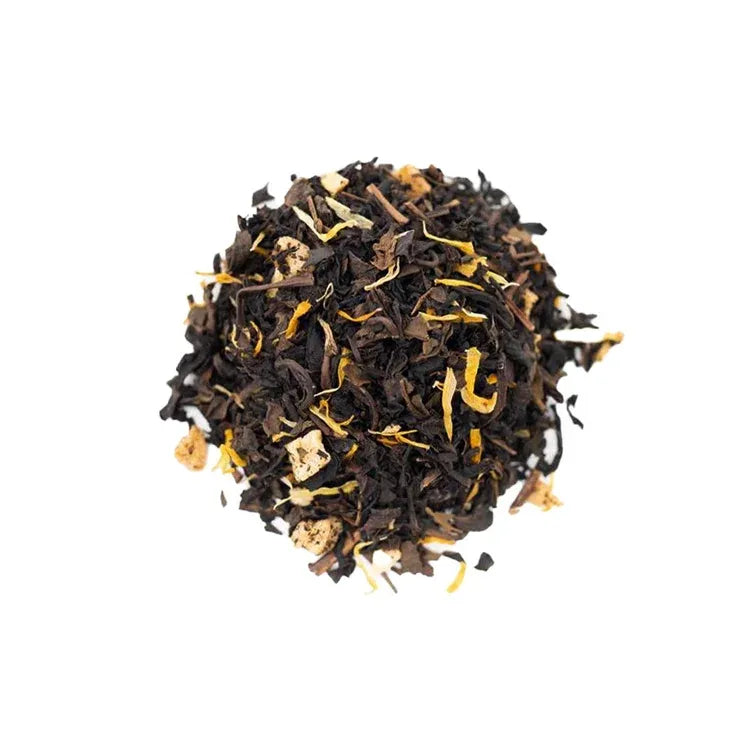 Loose oolong tea leaves with white peach and marigold, ideal for brewing.